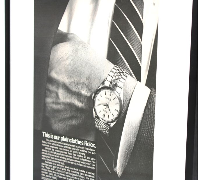 Authentic framed 1966 Rolex Oyster Perpetual "This is our plainclothes Rolex" Print Ad