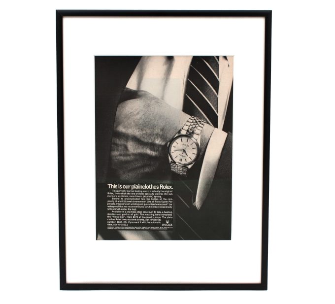 Authentic framed 1966 Rolex Oyster Perpetual "This is our plainclothes Rolex" Print Ad