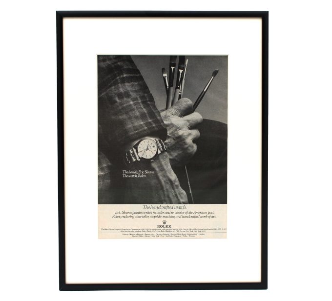 Authentic framed 1977 Rolex Oyster Perpetual "The hands, Eric Sloane. The watch, Rolex." The handcrafted watch. Print Ad