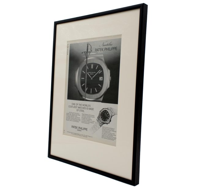 Authentic framed 1978 Vintage Print Ad Patek Philippe Nautilus - "One of the most costliest watches is made of steel"