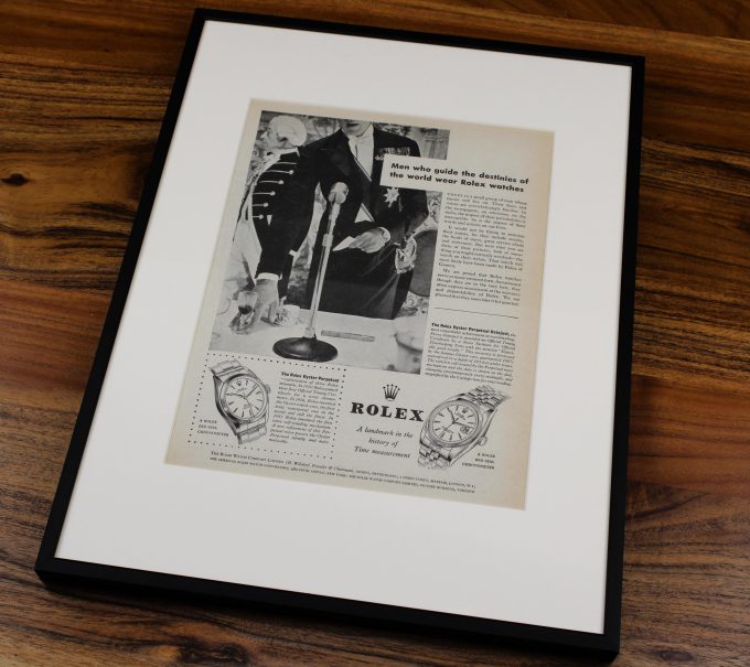 Authentic framed 1950's “Men who guide the destinies of the world wear Rolex watches.” authentic Print Ad