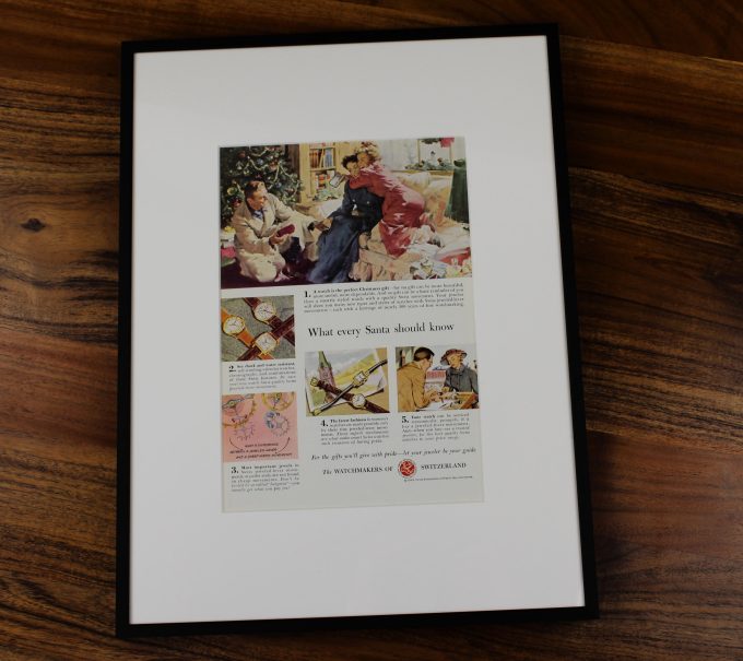 Authentic framed 1950's “What Every Santa Should Know” Watchmakers of Switzerland Christmas Print Ad